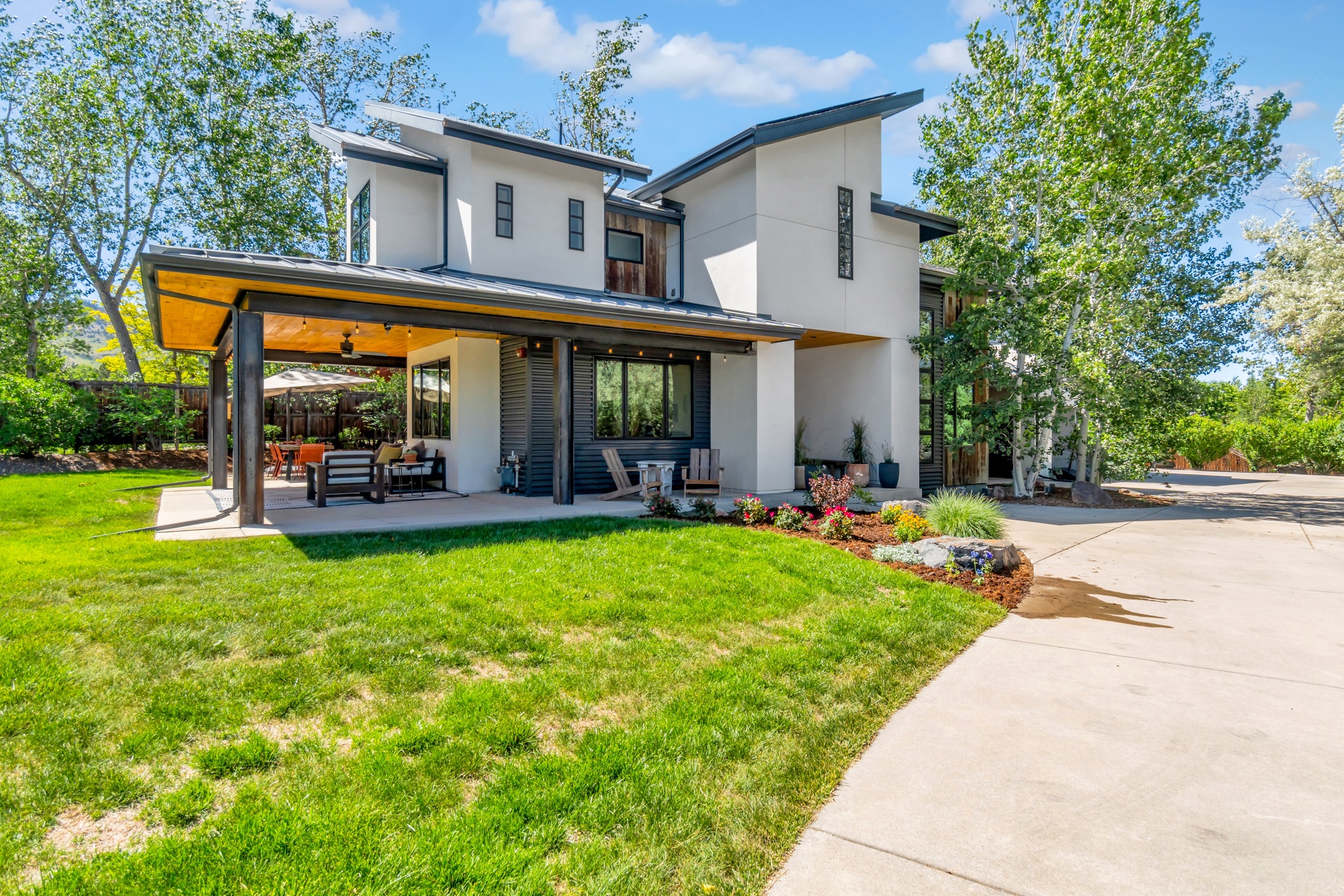 Image of Serene Orchard Avenue Sanctuary with Modern Boulder Charm